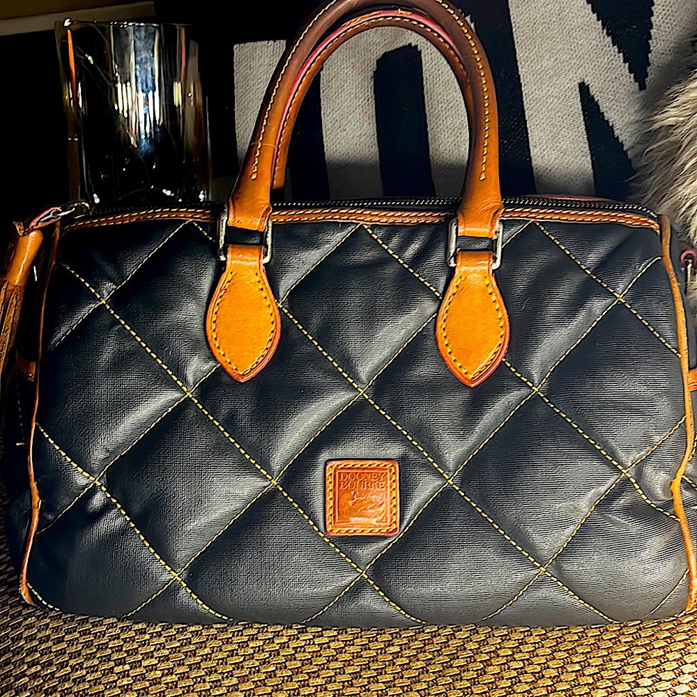 Vintage limited edition Dooney and Bourke black quilted handbag!